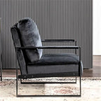 25.4 Fauteuil en velours avec accoudoirs métalliques